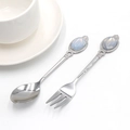 Vintage silver cutlery set with blue moonstone inlays, featuring a spoon and a fork - Synthetic Opal