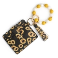 Silicone bead keychain bracelet with sunflower pattern card holder and black tassel - Sunflower