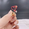 Gold stethoscope brooch with red enamel heart and sparkling zircon stone detail - Zircon Heart Stethoscope