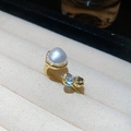 Close-up of gold vintage ring with baroque pearl and zircon on beige velvet tray - Style 3 Gold-Baroque Pearl Round Zircon