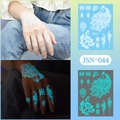 Luminous henna tattoo sticker JSN-044 with peacock lace pattern glowing blue in the dark - JSN-044 (Luminous Peacock Henna)