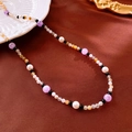 Detailed shot of multi-color baroque pearl and crystal beads on a red silk background - 21# Necklace - Purple White Black Mixed