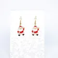 Festive Santa Claus dangle earrings with gold plating and red enamel finish for Christmas - Santa Claus