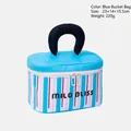 Bolsa de maquillaje tipo cubo a rayas azules con texto MILO BLISS y asa negra - Bolso cubo azul