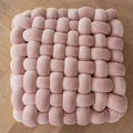 Pink hand-woven velvet square decorative pillow cover on light wood floor background - Braided Cushion Powder Pink