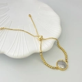 Detail of gold heart charm and beaded beads on an adjustable religious bracelet - Heart Style (Style B)
