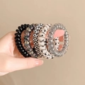 Set di cinque elastici per capelli a spirale stile cavo telefonico con motivi floreali - Set da 5 Pezzi Nero