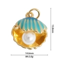 Detailed view of 18K gold plated dolphin shell pendant with enamel and pearl details - Blue Gold Open Shell Pearl