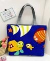 Navy blue canvas tote bag with yellow sea turtle and orange tropical fish print - Undersea World