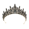 Close-up of vintage black gold crown with intricate metalwork and black rhinestones - Black Gold with Black Stones