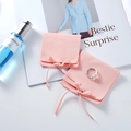 Pink microfiber jewelry pouch with silk ribbon and a silver heart ring on a white base - Microfiber Ribbon Style / 7*7cm / Light Pink