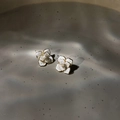 Elegant camellia stud earrings featuring cream petals and a gold-plated metal edge - Silver Needle - Dripping Oil.