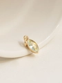 Macro detail of 18K gold-plated oval pendant with light blue marquise-cut zircon gemstone - March/Light Blue