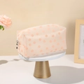 Portable pink mesh makeup bag with daisy embroidery and secure silver zipper closure - Pink Flower Style