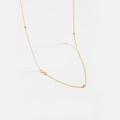 Detail of gold letter S necklace featuring a polished finish and three sparkling zircon accents - S / 925 Sterling Silver Plated With 18k Gold