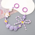 Beaded phone strap with white Maneki-neko, purple pom-poms, and letter E charm - Purple Lucky Cat Style (K2782)