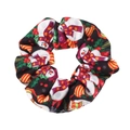 Detail of Christmas scrunchie featuring festive snowman and berry prints on black fabric - Black