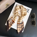 Satin neck scarf in champagne gold with chain print and logo pattern on leather background - 67 Square Scarves / 65