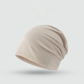 Beige slouchy knit beanie hat for women featuring a soft texture and loose fit design - Solid Minimalist Style / Beige