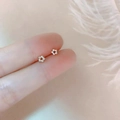 Minimalist silver flower stud earrings in a dainty six-petal design for daily wear - Round Beads / Silver