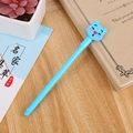 Blue cartoon bear gel pen for students with a minimalist design and cute animal cap - Red Nose Bear Blue