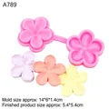 Pink five-petal flower silicone mold with finished floral clay and fondant samples - Pink