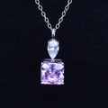 Detail showing a pink radiant cut carbon diamond pendant on a silver necklace - Pink Zirconia Pendant (No Chain) - White Gold Plated