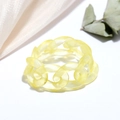 Detail of a translucent yellow resin chain ring with a matte finish on a minimalist background - Matte Yellow