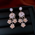 Elegant vintage flower drop earrings with sparkling crystals and a golden finish - 56# Silver Earring Post - Gold - Clear - Full Rhinestone Dangle Flower Long
