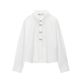 White long-sleeved poplin shirt featuring sparkling rhinestone bow buttons on plain background - XS / White