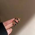 Detail of gold double-layered C-shaped earrings with black velvet chain texture - Metal Wrapped Velvet C-Hoop (55#) / Black & Gold