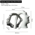 Abstract silver and white ceramic face vase sculpture with dimensions 26.5x19cm - Mutual Affection Vase - Electroplated Silver