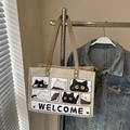 Beigefarbene Canvas-Einkaufstasche mit süßem Katzenmotiv und Welcome-Aufdruck - Khaki