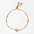 Adjustable golden stainless steel heart bracelet with shimmering cubic zirconia accents - Gold Heart Style (SBK478)