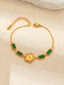 Detail of gold vintage bracelet featuring emerald-green zircons and radial floral center - Emerald Rectangular Zirconia Flower (TYGB0020)