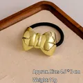 Polished gold metal bow hair tie with black elastic band, size 4.6x3cm hair accessory - Gold Bow Tie
