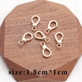 Set of 6 gold plated 18k lobster clasps for DIY jewelry on a wooden tray 1.8x1cm - M82408 Small Gold Lobster Clasp
