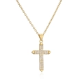 Macro detail of gold-plated cross pendant with micro-pave cubic zirconia on white background - Gold Full White Zirconia Inlaid Style