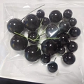 Detail of 20pcs glossy black foam balls with green stems for cake decoration in polybag - Mixed 20 Pieces Set / Black