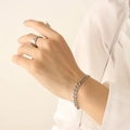 Silbernes asymmetrisches Kettenarmband und strukturierter breiter Ring für Damen - 14+5cm / Stahlfarbe