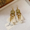 Detailed macro view of bohemian tassel earrings with crystal studs and golden feathers - 5# Gold - Beige Feather Style (Ear Hook)