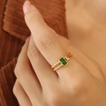 Adjustable gold titanium ring with a rectangular green zircon and twisted rope band - Size 7 (Adjustable) / Gold Green Zirconia