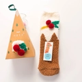 Plush coral fleece Christmas socks with festive red pompoms in a brown triangle gift box - Cherry