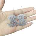 Orecchini pendenti con segno del dollaro glitter argento stile punk hip-hop donna - Gancio Argentato