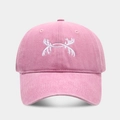 Detailed view of pink washed cotton baseball cap featuring white antler embroidery - Adjustable / Pink