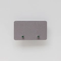 Close-up of emerald green cubic zirconia stud earrings with silver four-prong setting - May: Emerald Green