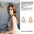 Beige raffia teardrop earrings with white fan-shaped tassels for summer vacations - Fan Shaped Raffia Tassel Style (HE21253) / Steel Earring Post