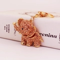 Creative golden elephant keychain with champagne rhinestones for women's handbag accessory - Champagne