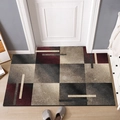 Minimalist geometric door mat with brown and grey patterns on wooden floor - Parallel Lines