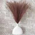 Brown artificial pampas grass bouquet in a white matte ceramic vase on vintage newspaper - 43-45cm 7 Forks / Dark Coffee